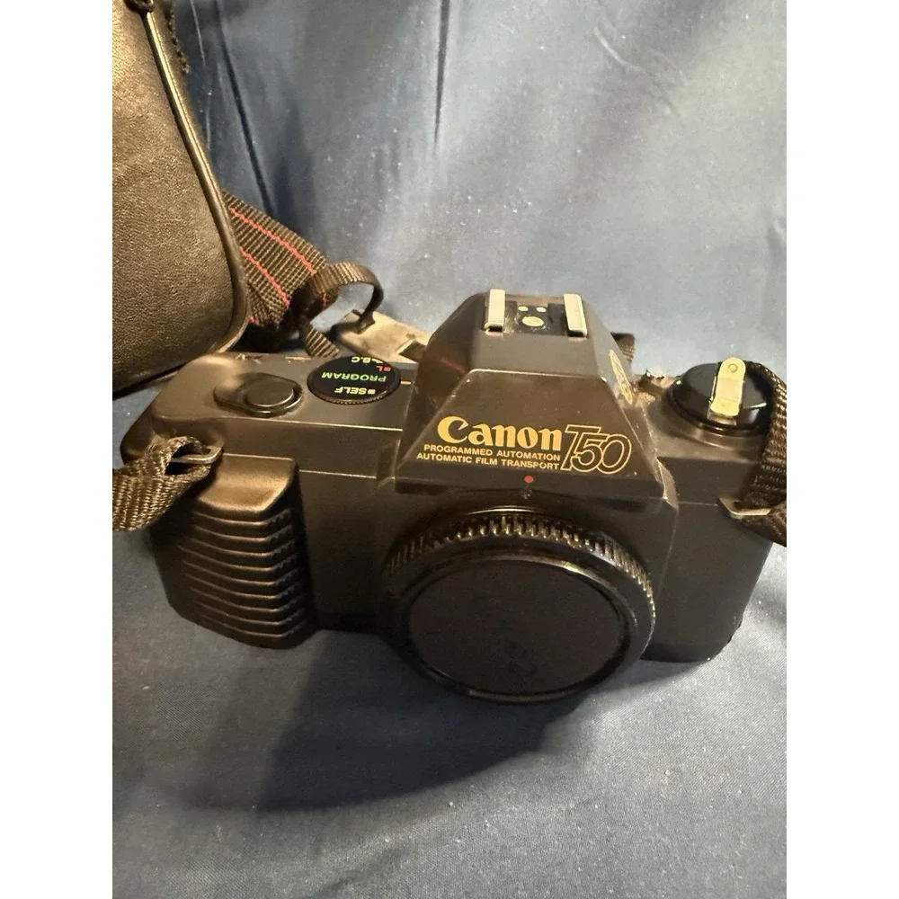 Canon T50 camera Vintage With Bag Will Power On Not Tested With Film